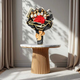 Chocobliss Bouquet Gift featuring Ferrero Rocher chocolates and red roses displayed on a marble table. Perfect for elegant gift presentations.